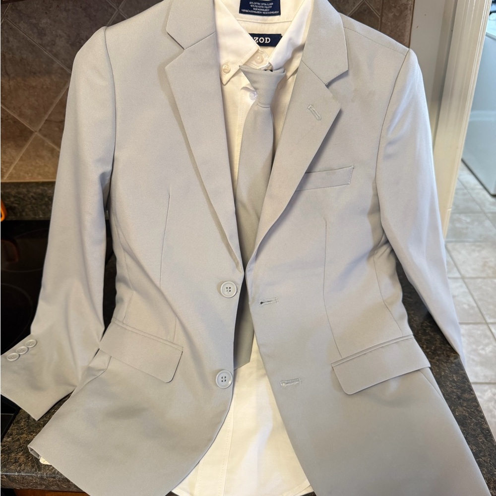 Light Gray Suit for Boys with button up shirt, pants, and tie. Worn once
